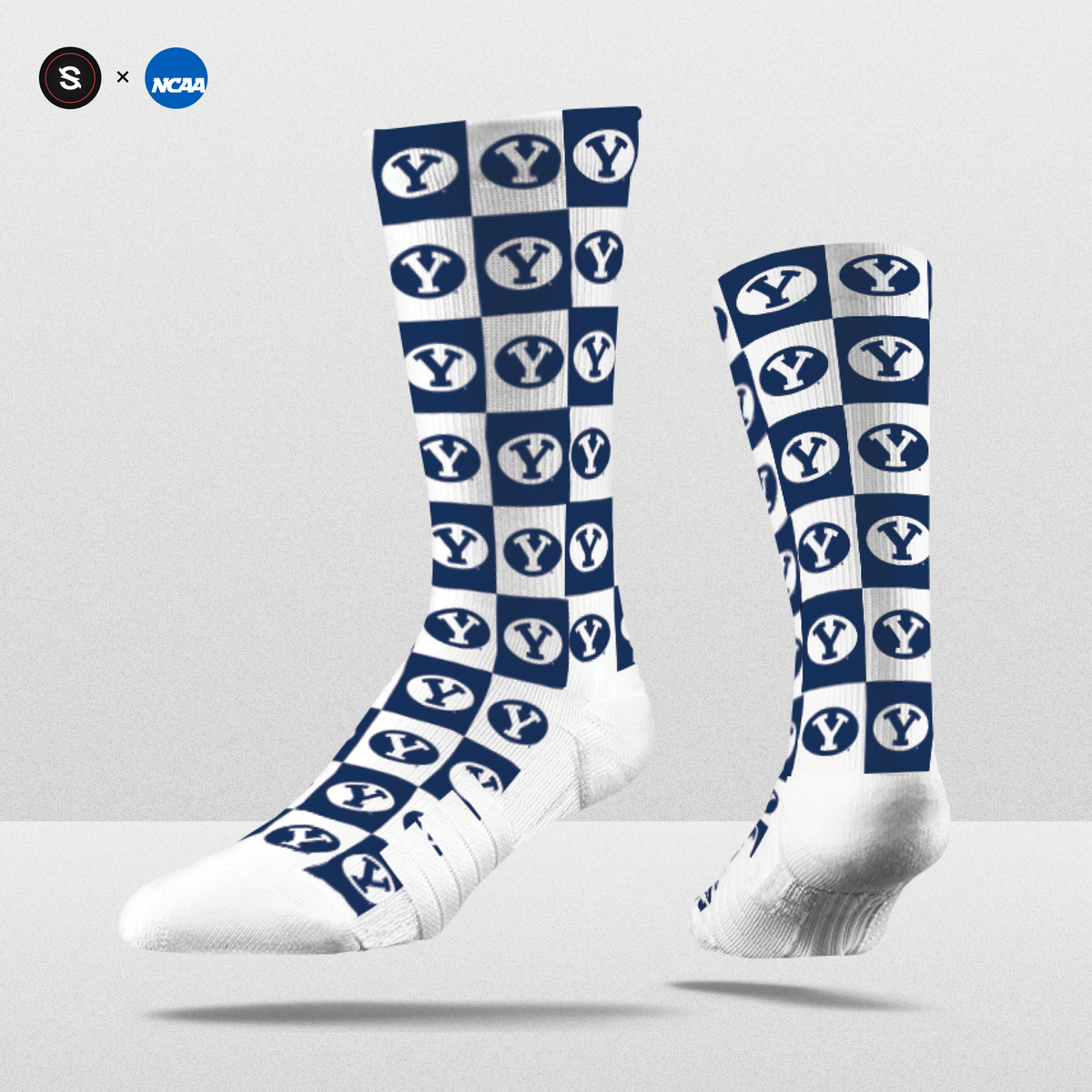 NCAA 70s Checkered socks in navy and white with team logos, perfect for fans and collectors. Limited edition crew style.