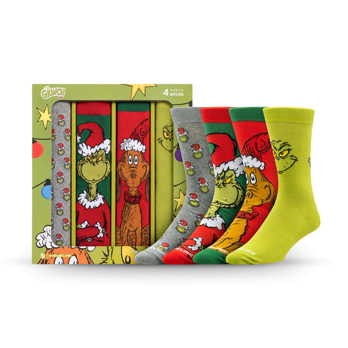 Four colorful socks featuring the Grinch in festive designs, packaged in a green box with holiday decorations.