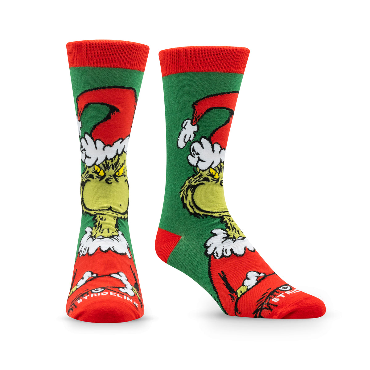 Green and red socks featuring the Grinch with a Santa hat and a mischievous expression.