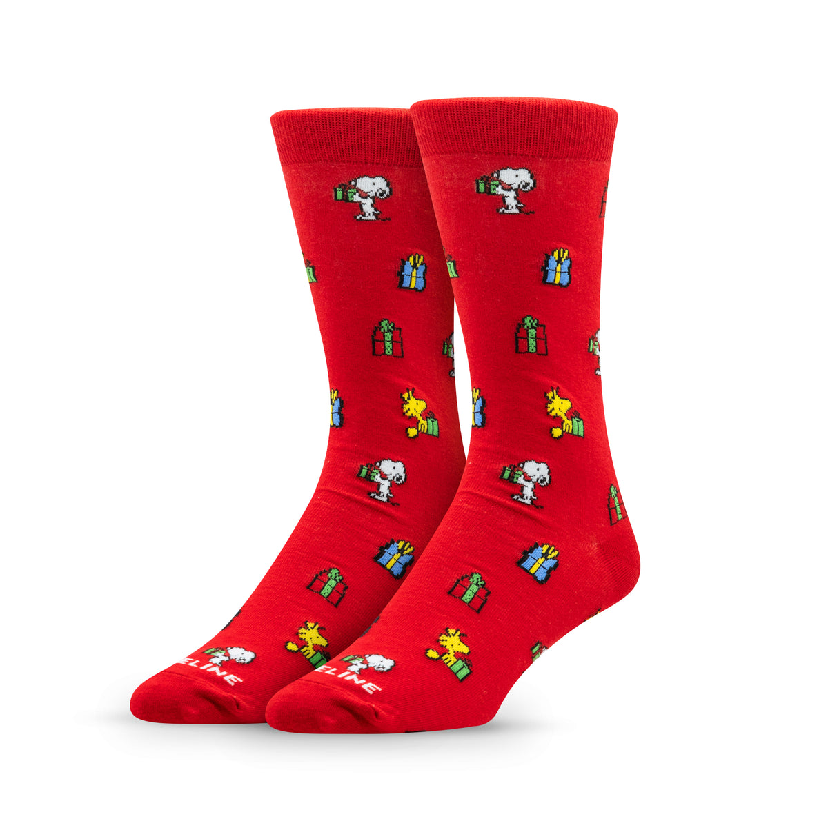 Red socks featuring Snoopy and festive gifts in a playful pattern.