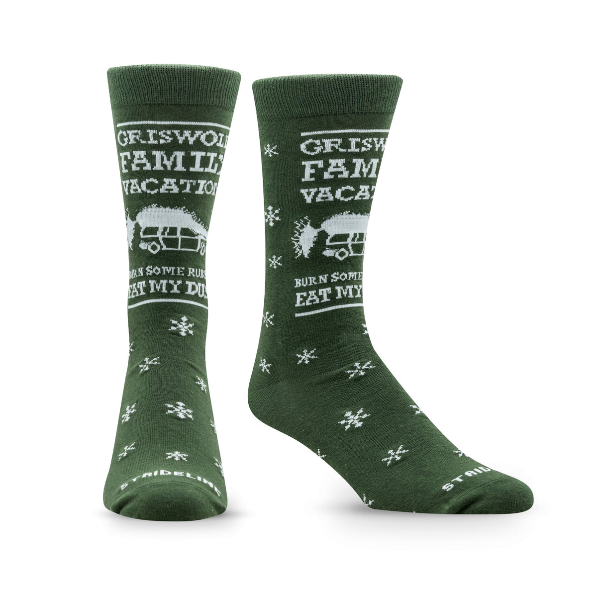 Green socks featuring "Griswold Family Vacation" text and a graphic of a car, with snowflake patterns.