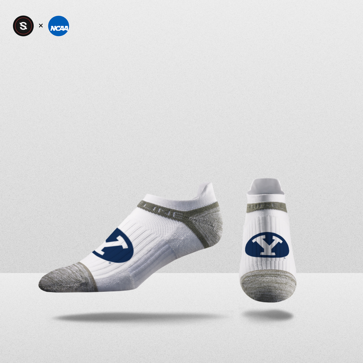NCAA Logo Ankle Socks in white with gray accents, featuring team logo for fanwear.