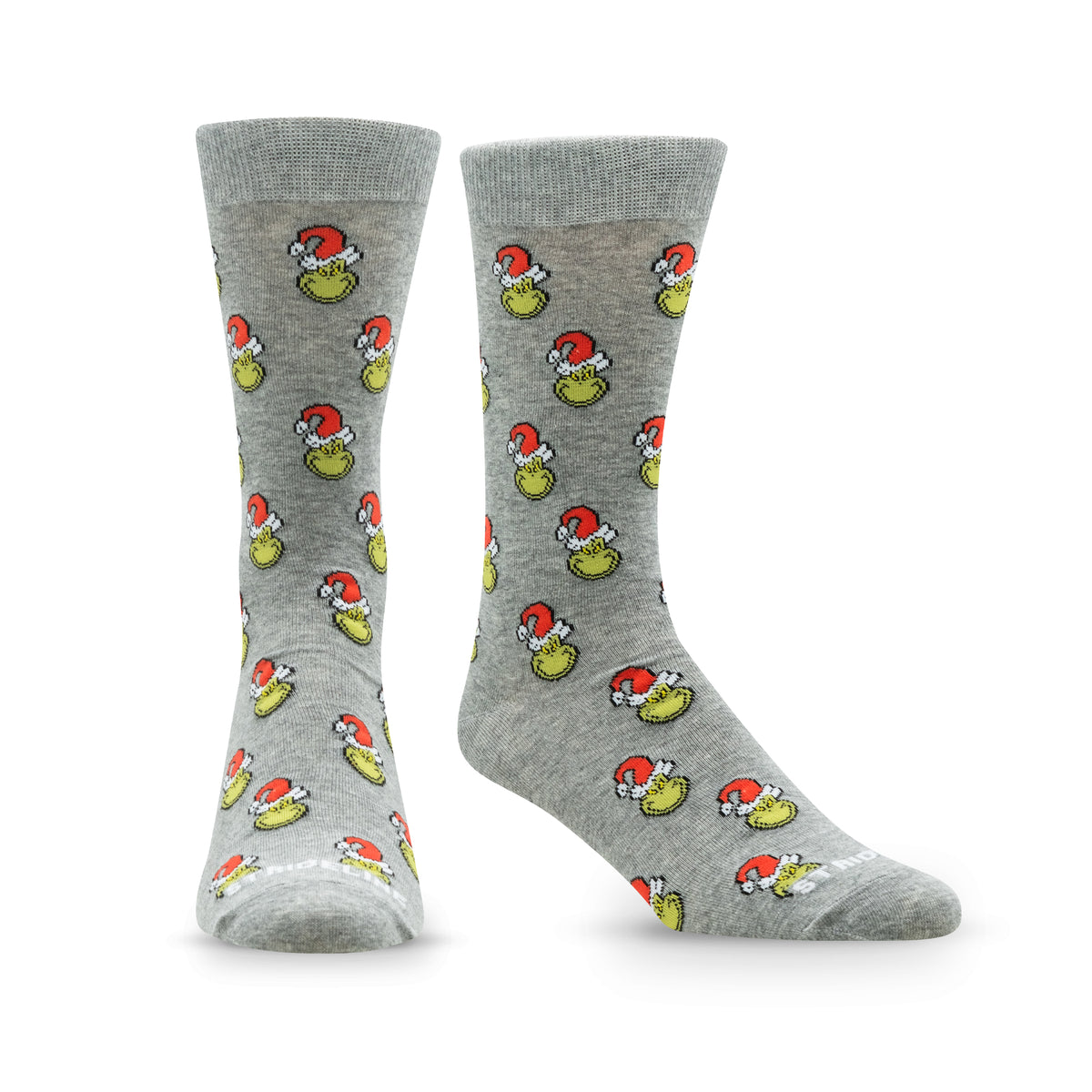 Gray socks featuring a playful pattern of yellow ducks wearing red hats.