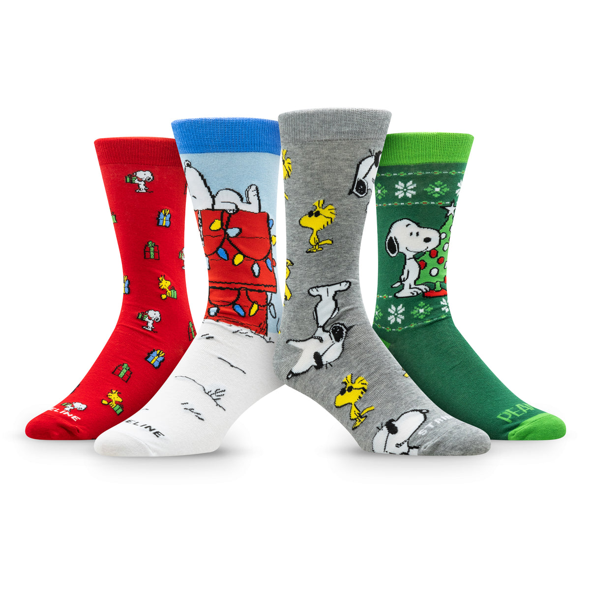 Four pairs of colorful socks featuring Snoopy and Woodstock in festive designs.