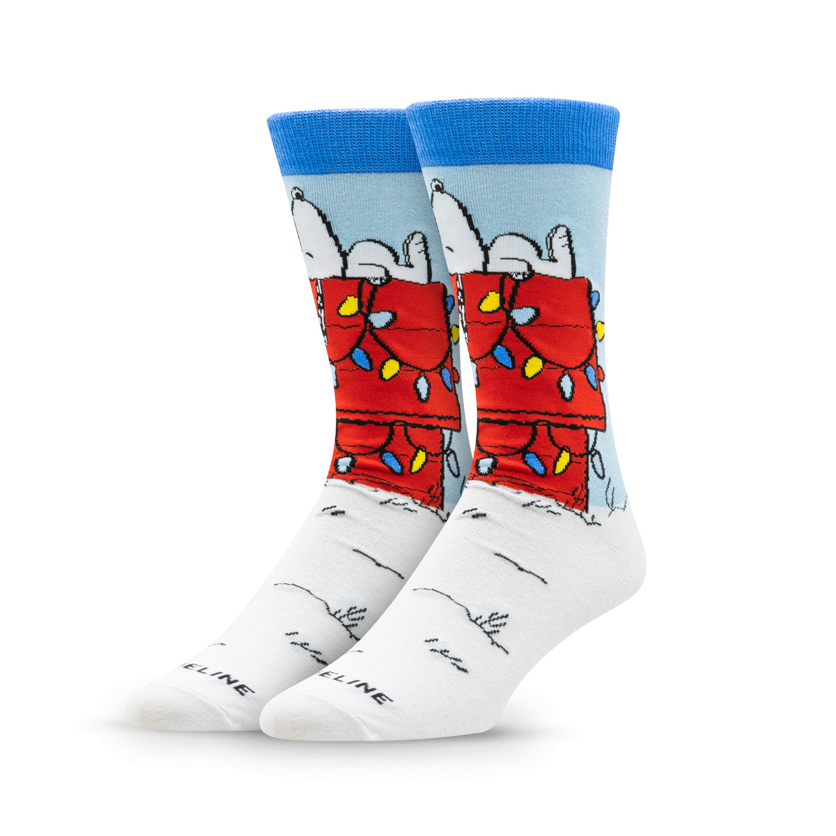 Colorful socks featuring a cartoon character wrapped in Christmas lights and a red blanket against a light blue background.