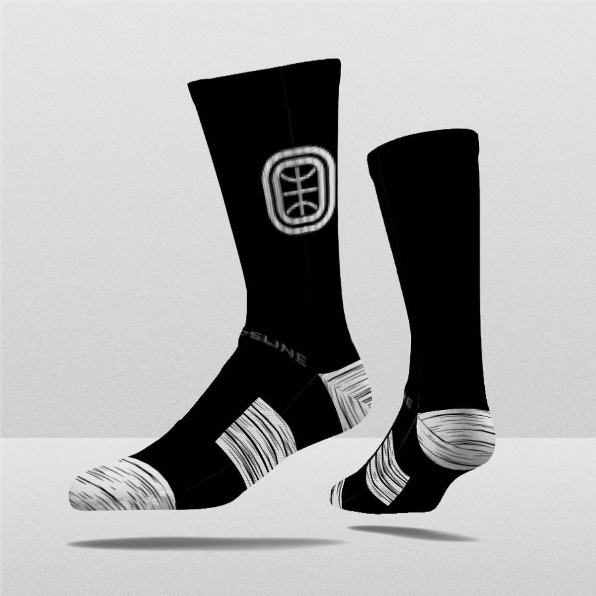 Overtime Elite Crew Socks in black with white accents, featuring a logo and striped design. Limited edition fanwear.