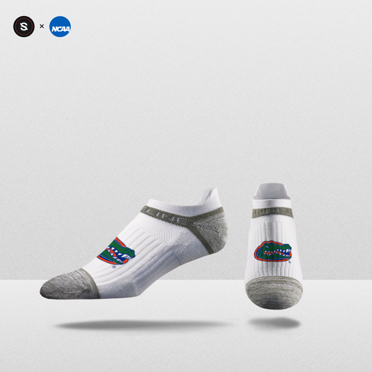 NCAA Logo Ankle Socks in white with gray accents, featuring team logo for fanwear.